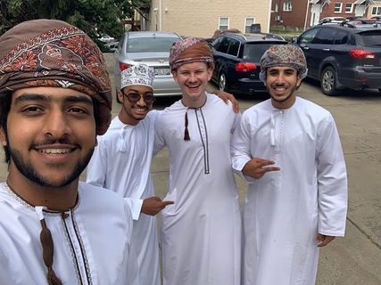 Omani students wearing traditional clothes